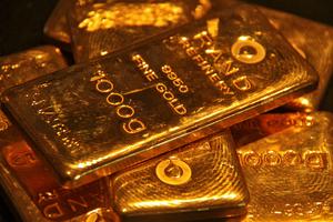 FILE PHOTO: Gold bars are displayed at a gold jewellery shop in the northern Indian city of Chandigarh