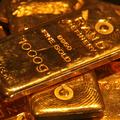 FILE PHOTO: Gold bars are displayed at a gold jewellery shop in the northern Indian city of Chandigarh