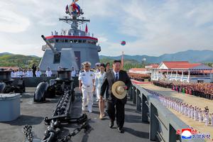North Korean leader Kim Jong Un attends the launching ceremony of a warship that had been damaged upon its first attempt to launch
